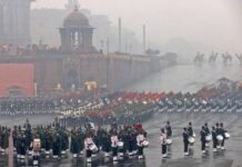 Members of the Indian military band take part in the Beating the Retreat ceremony during rains in New Delhi, India, January 29, 2023.